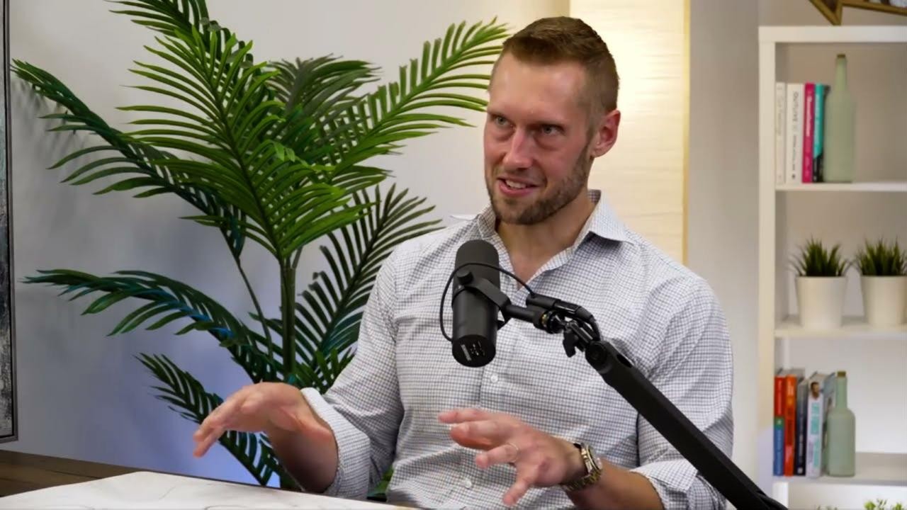 Andrew explaining on a podcast