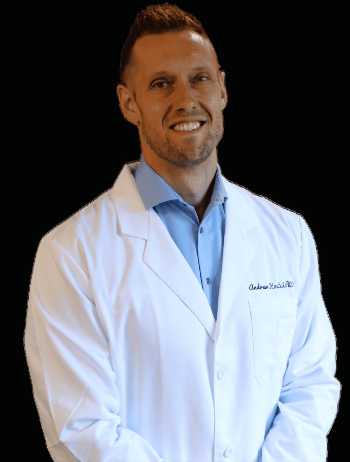 Dr. Andrew Koutnik in his white coat